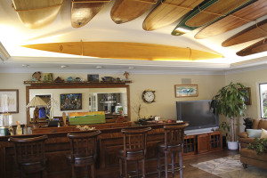 The collector's spread of wooden pieces on display above the mini bar at his residence.